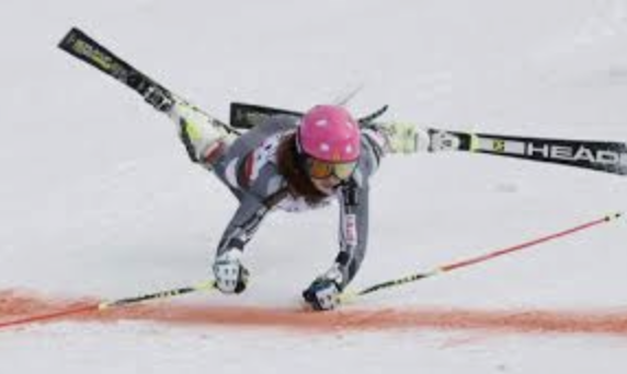 WC Skiing crash across finish line.